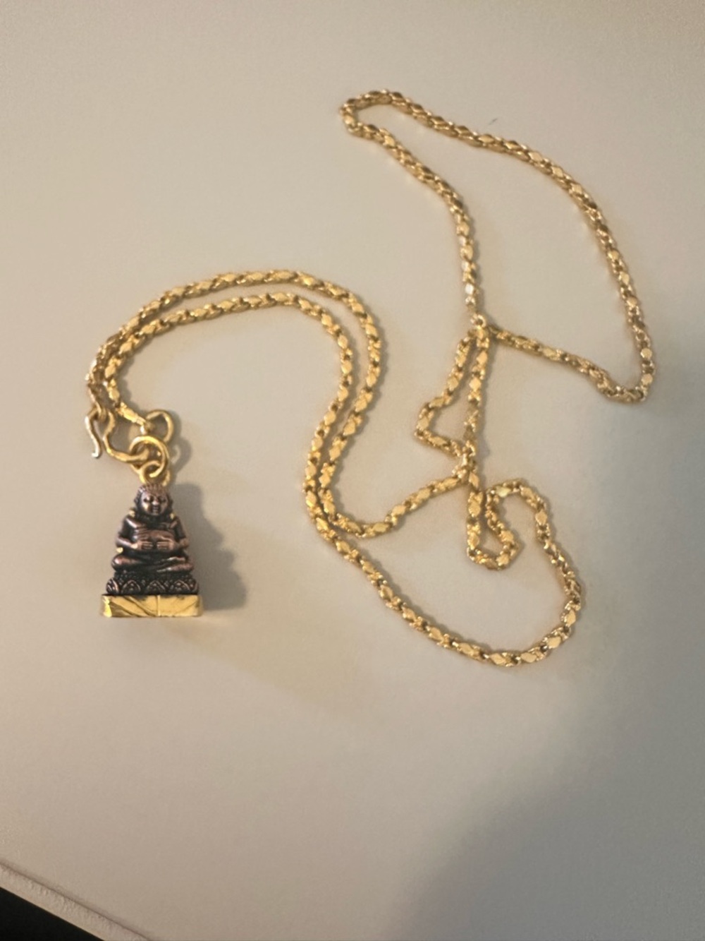 24k solid gold Buddha over an ounce